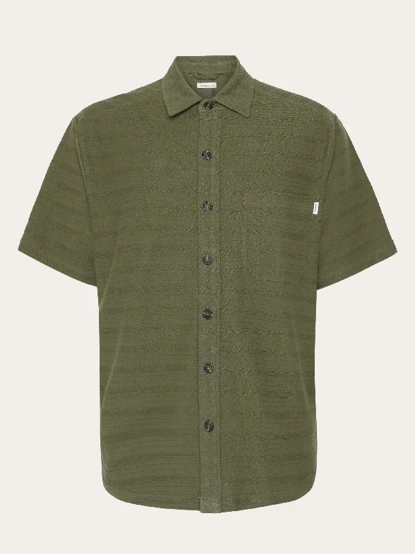 Men's short-sleeve yellow beach shirt-Loose short sleeve cotton solid striped jersey shirt GOTS/Vegan - Burned Olive